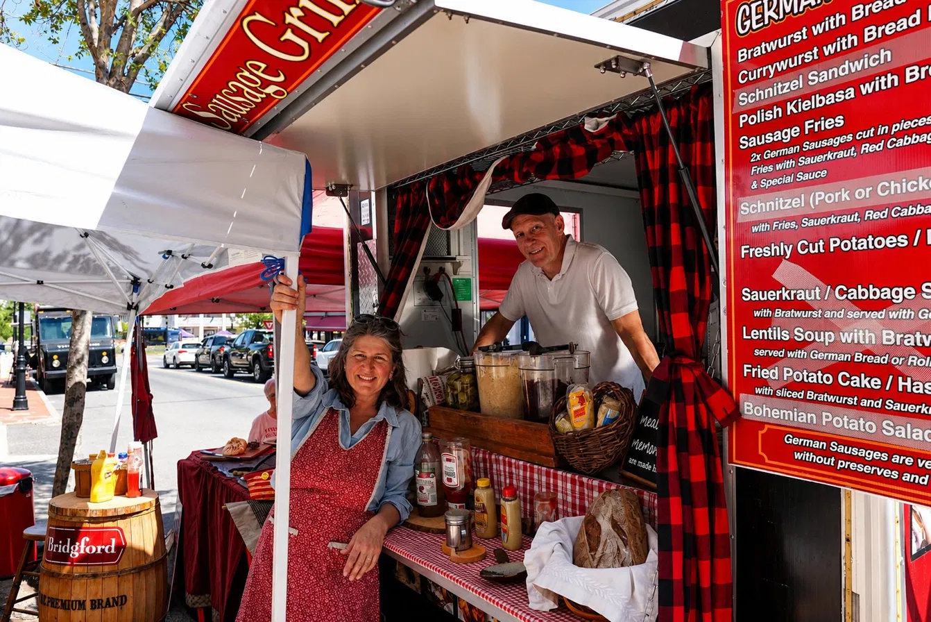 Petra and Brian smiling together at the Euro Bites truck window